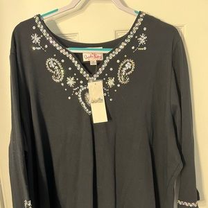 Women’s black light sweater with sequence.